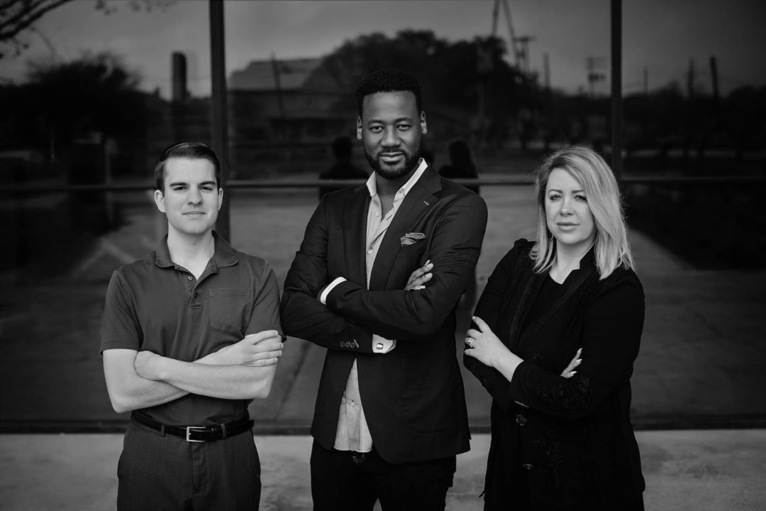 Black and White group photo of the SFG team