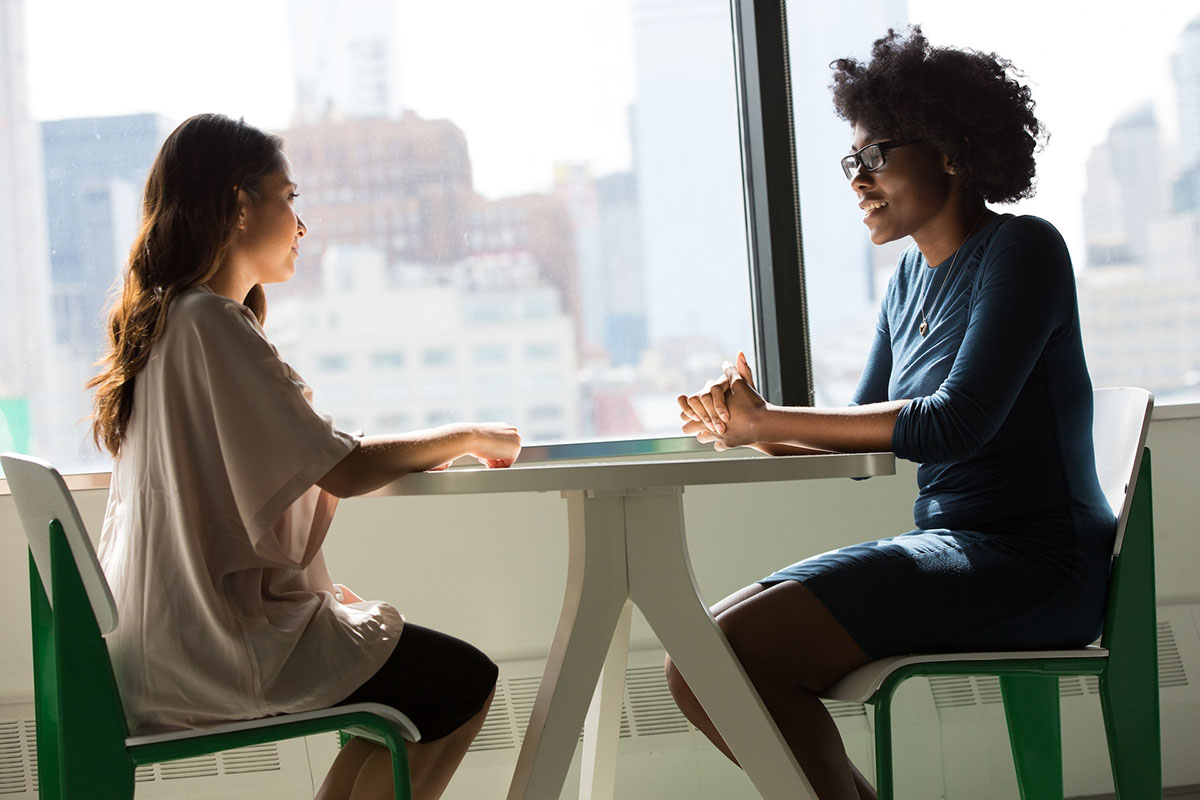 2 professionals in an investment management meeting